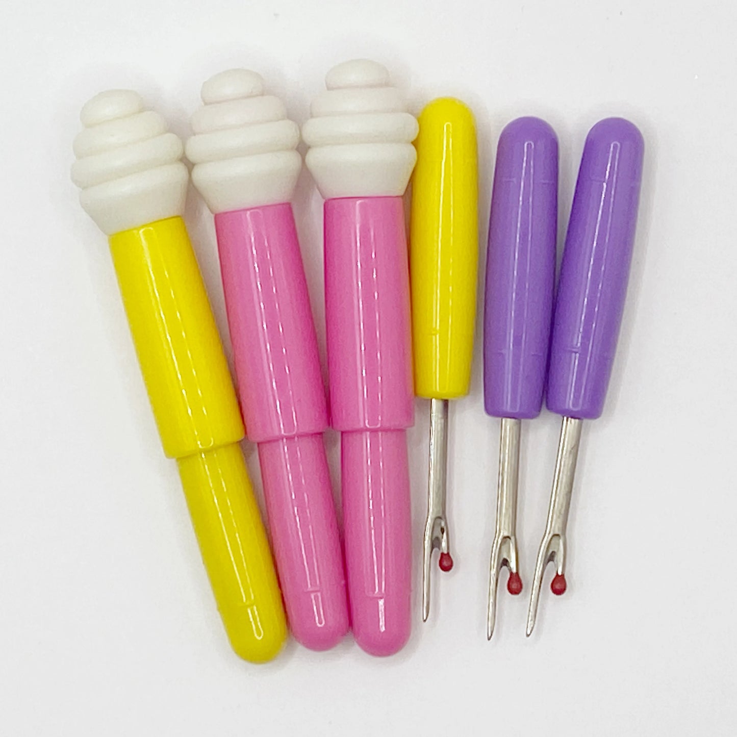 Taglia asola con gommino