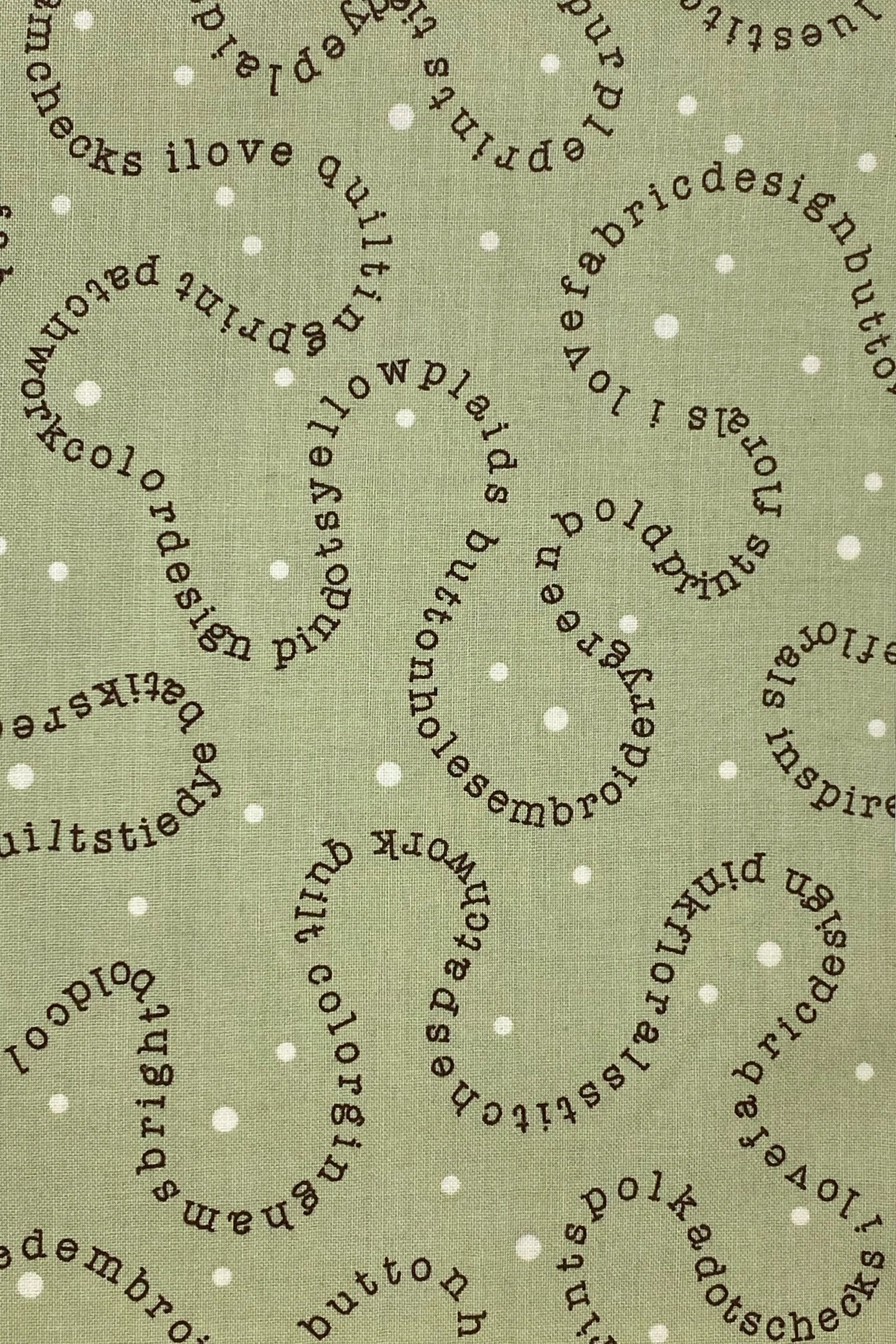 Tessuto Americano Wordplay fondo verde 100% cotone h 110 - 18,00€/mt