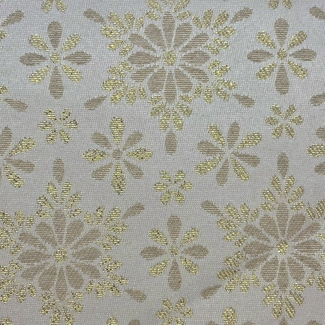 fiori e oro in lumet